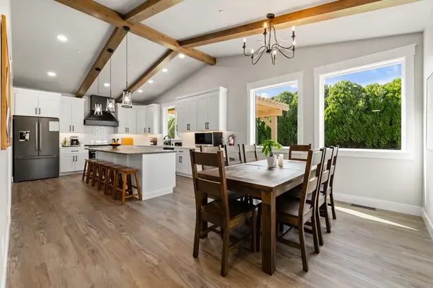 Wide view of dining and kitchen space