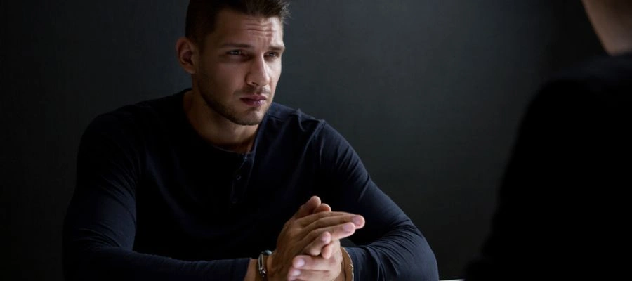 Man sitting evaluates the choices of Rehab at Icarus Idaho vs a Jail Sentence 