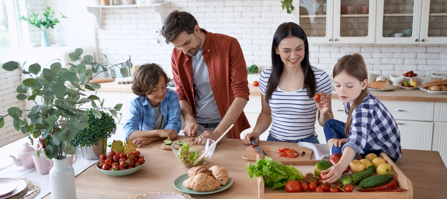 Image of parents and their children Preparing Healthy Meals - Self-Care and Basic Life Skills