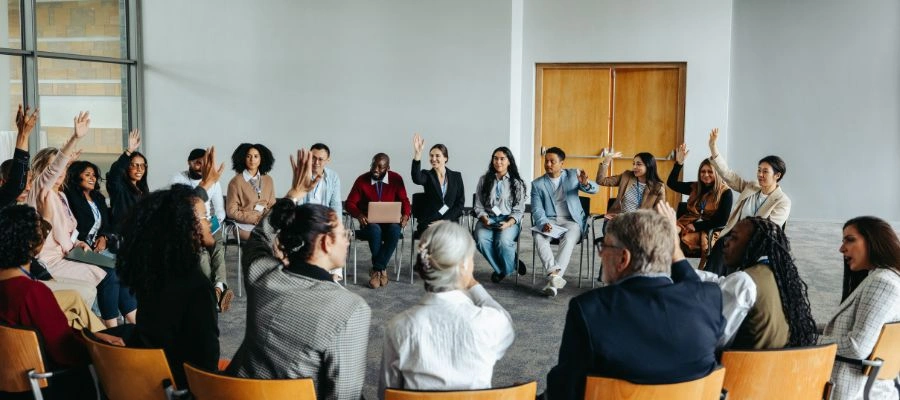People sitting gathered in a room at an NA meeting - Top NA Meetings, Boise Idaho
