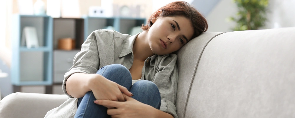 Image of woman showing emotional numbness, a subtle sign of high-functioning PTSD