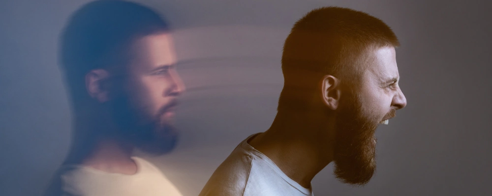 Person showing emotional distress, illustrating symptoms of borderline personality disorder