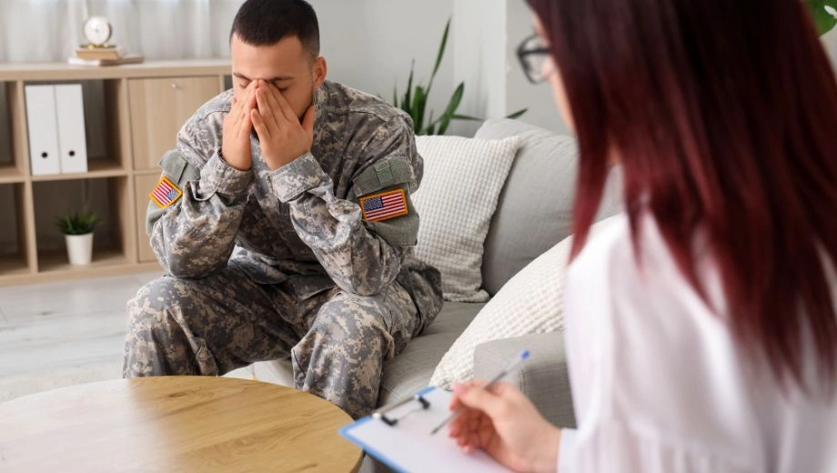 Image of a soldier in therapy with a counselor - Does Tricare Cover Dual-Diagnosis Treatment - Icarus Wellness and Recovery
