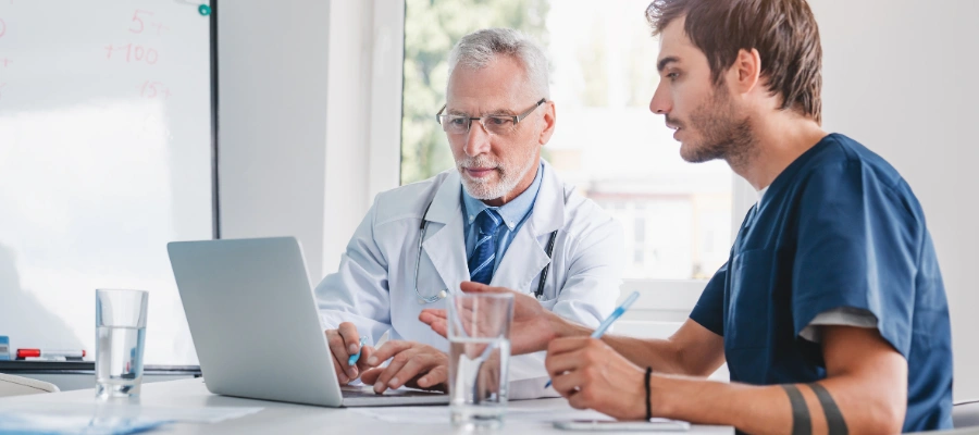 Image of medical professionals reviewing reports on kratom safety and overdose cases