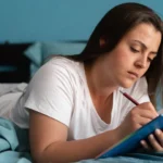 Image of a woman working on her IFS therapy worksheet - IFS Therapy Worksheets and PDF Resources - Icarus Wellness and Recovery