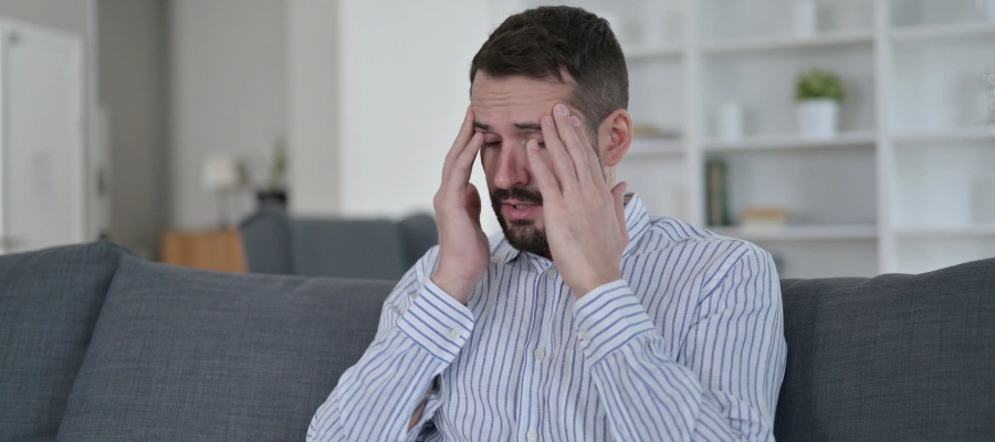 Image of a man struggling with inner conflicts and emotional stress