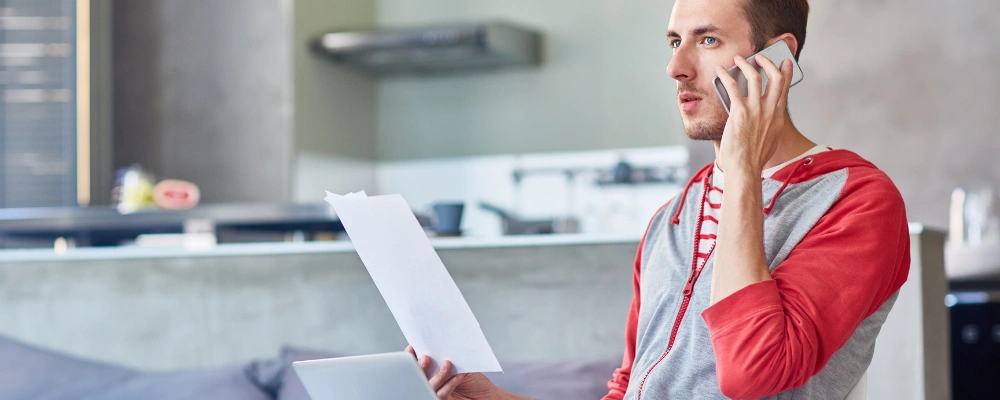 Image of a patient speaking with a Icarus Wellness admissions representative by phone to verify Magellan rehab coverage