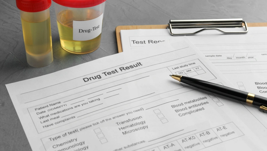 Image of a pen sitting on top of a drug test - What Happens If You Fail A Drug Test on Probation in Idaho- Icarus Wellness and Recovery