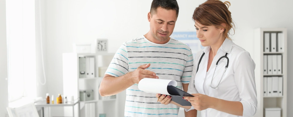 Image of patient consulting with admissions staff at Icarus Wellness for marijuana rehab in Boise