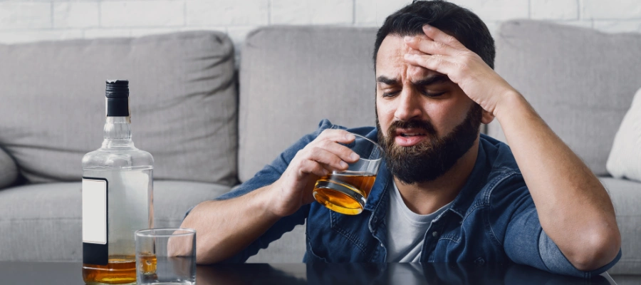 Image of a person recognizing signs that their alcohol consumption has become a serious problem