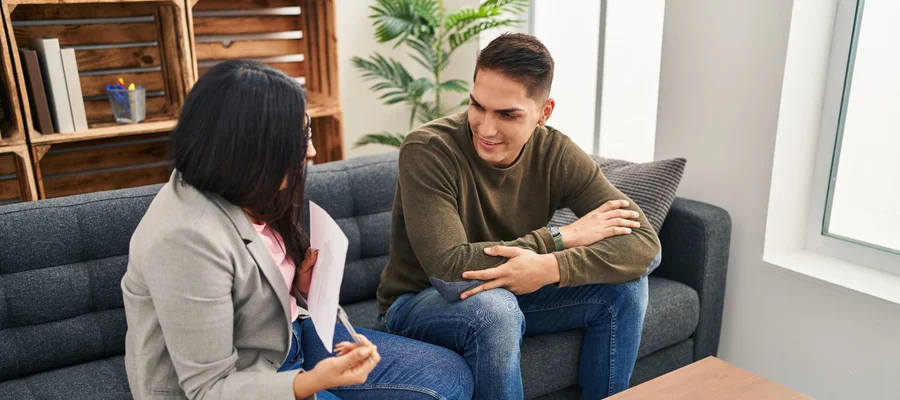 Image of a therapist and patient working together on practical coping skills during an individual addiction therapy session