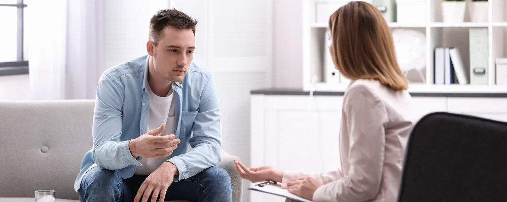 Image of patient receiving professional guidance on medications for bipolar and PTSD symptoms