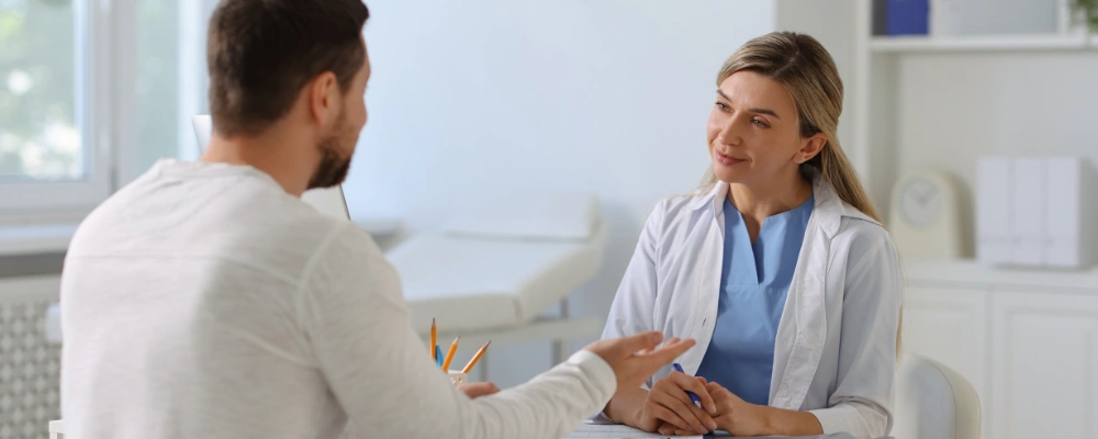 Image of a doctor conducting a comprehensive clinical assessment to evaluate a patient's treatment needs and options