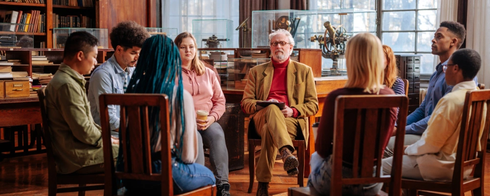 Image of people sitting in a circle during a Narcotics Anonymous peer support meeting near Marsing Idaho