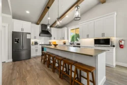 Spacious modern kitchen with island seating at Icarus Behavioral Health Idaho