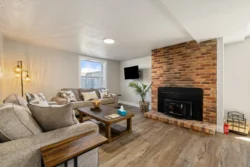 Comfortable lounge area with fireplace and seating at Icarus Behavioral Health